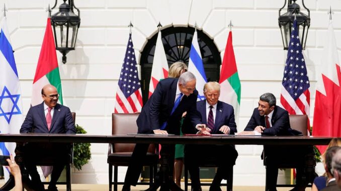 From left, Bahrain FM, Israeli PM, U.S. President, and UAE FM sign the Abraham Accords, Washington, DC, September 15, 2020.