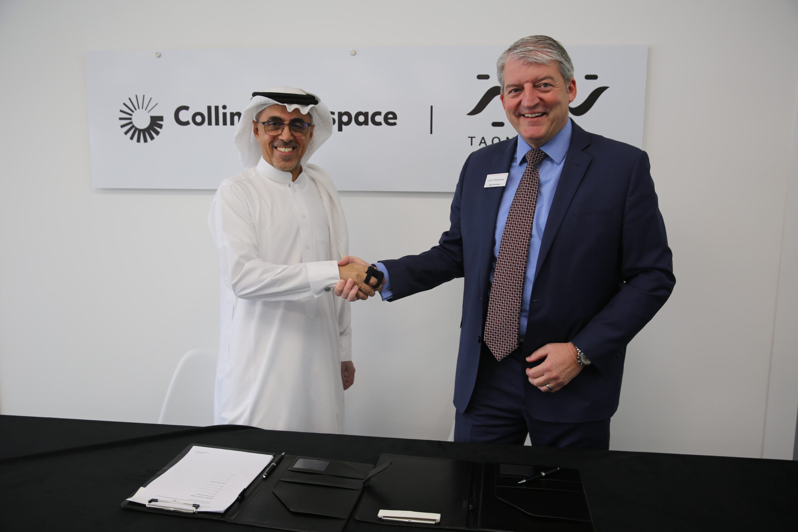 Colin Mahoney, President Customer & Account Management, Collins Aerospace On the left: Dr. Abdulrahman Alkhthlan, CFO of TAQNIA