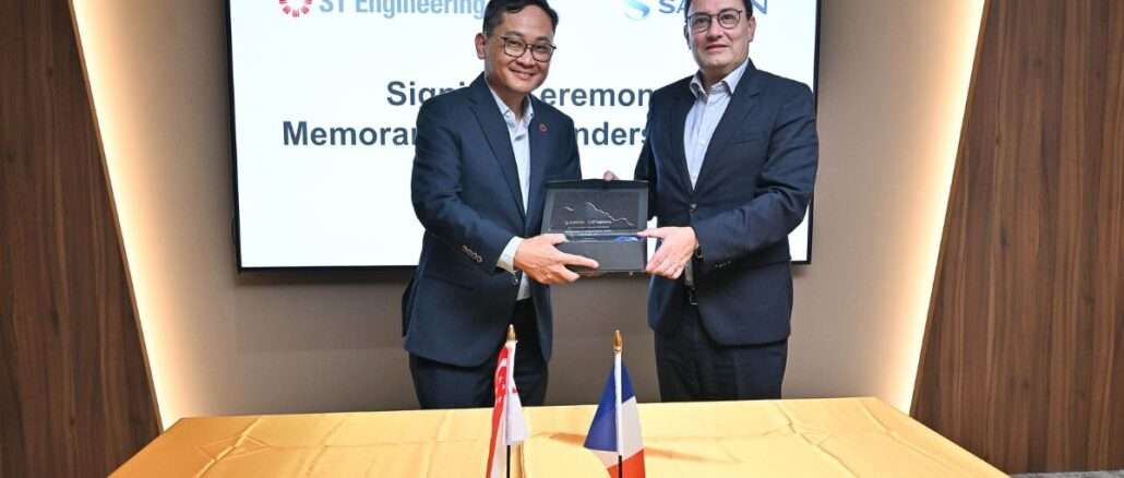 Mervyn Tan, President, Defence & Public Security, ST Engineering (left) and Alexandre Ziegler, Executive Vice President, GBU Defense, Safran Electronics & Defense (right) marking the completion of the MOU signing with the presentation of a commemorative plaque.