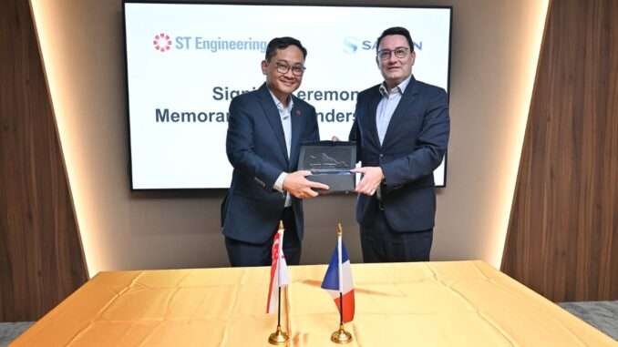 Mervyn Tan, President, Defence & Public Security, ST Engineering (left) and Alexandre Ziegler, Executive Vice President, GBU Defense, Safran Electronics & Defense (right) marking the completion of the MOU signing with the presentation of a commemorative plaque.